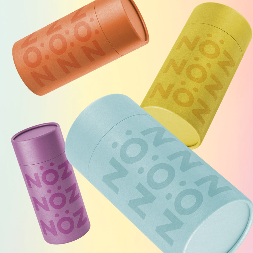 Orange, yellow, purple and blue shade of a vegan, cruelty-free, SPF Nöz sunscreen 